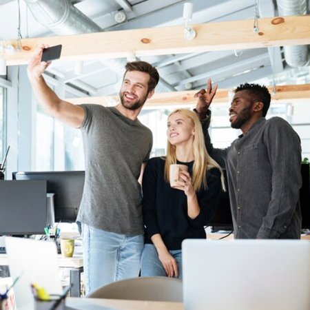 Happy workers in workplace